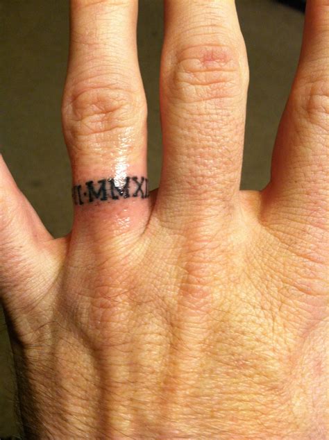 Wedding ring tattoo men - 2. Heart With Initials. A wedding band tattoo of a heart with your partner’s initials is another excellent tribute to the love of your life. It means that they are the most important constant in your life. 3. Wedding Date. One of the best ring tattoos for guys is getting inked with the wedding date on your ring finger. 